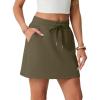 imageGRECERELLE 2026 Active Skirts for Women with Builtin Shorts and Pockets for Golf Tennis Hiking Workout Casual SkortArmy Green